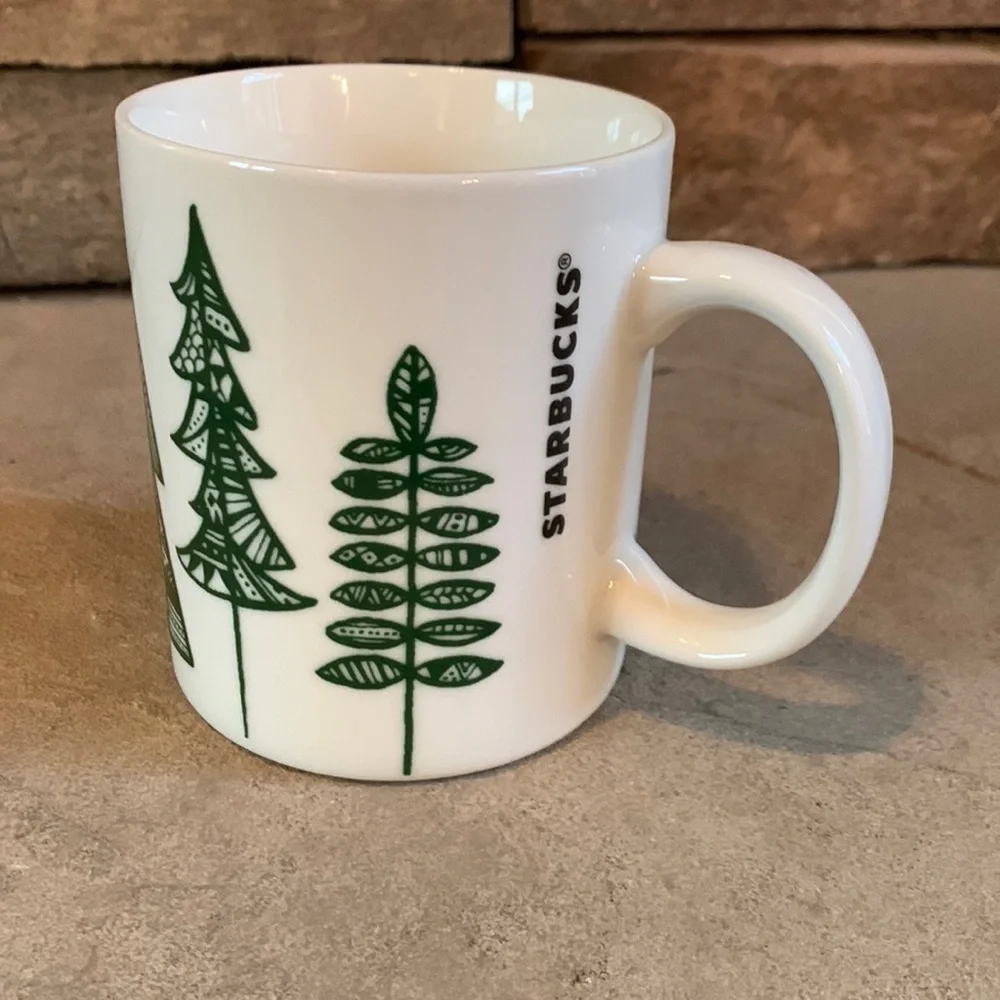STARBUCKS 2015 12oz white mug with green trees